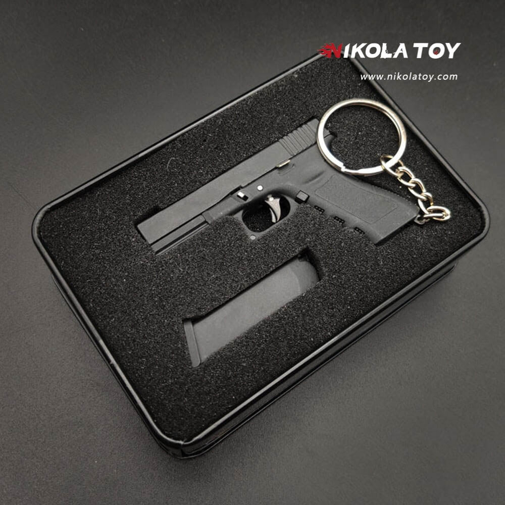 Tiny pistol KeyChain - Nikola Toy